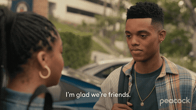 A Peacock Advertisement Shows A Man And A Woman Talking GIF