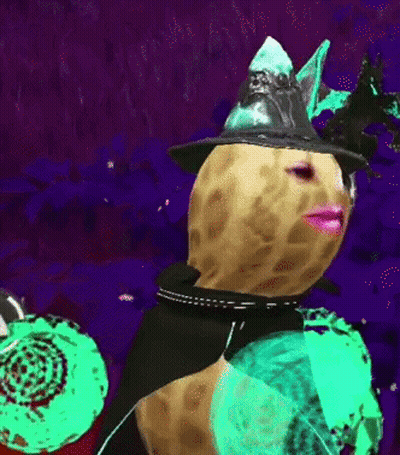 A Peanut Is Wearing A Witch Hat And A Black Cape GIF