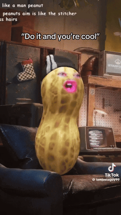 A Peanut With A Stitcher 'S Hat On Is Sitting In A Chair GIF