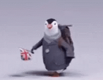 A Penguin Carrying A Backpack And Holding A British Flag GIF