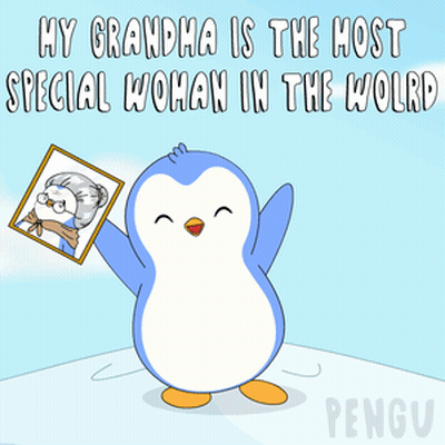 A Penguin Holds Up A Picture Of An Elderly Woman With The Caption My Grandma Is The Most Special Woman In The World GIF