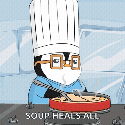 A Penguin In A Chef 'S Hat Is Stirring A Pot Of Soup That Says Soup Heals All On The Bottom GIF