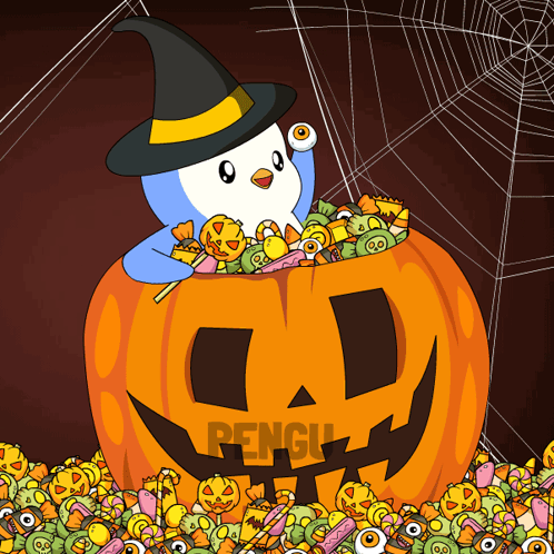A Penguin In A Witch Hat Is Sitting In A Pumpkin Full Of Candy GIF