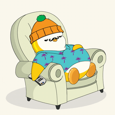A Penguin Is Sitting In A Chair With A Remote Control GIF