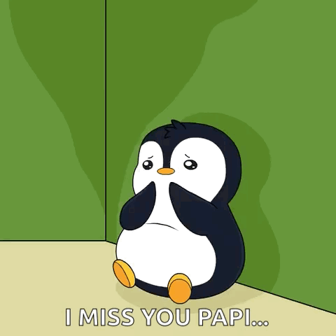 A Penguin Is Sitting In A Corner With The Words I Miss You Papi Written Below It GIF