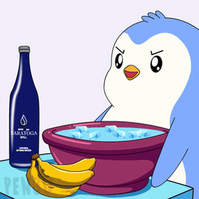 A Penguin Is Sitting Next To A Bottle Of Saratoga Still Water GIF