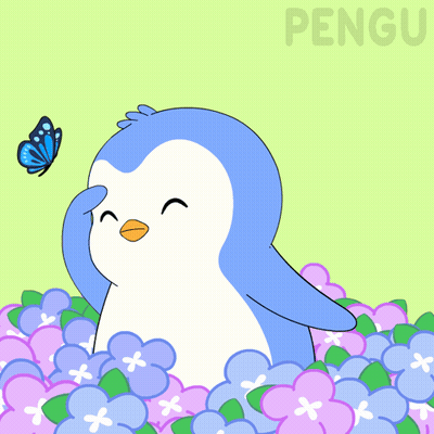 A Penguin Is Standing In A Pile Of Purple Flowers And A Butterfly Is Flying In The Background GIF