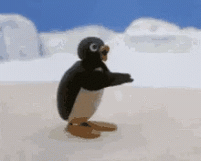 A Penguin Is Standing On Its Hind Legs On A Snowy Beach . GIF