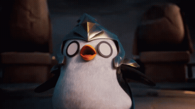 A Penguin Wearing A Helmet With Circles On It 'S Eyes GIF