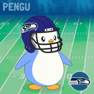 A Penguin Wearing A Seattle Seahawks Football Helmet GIF