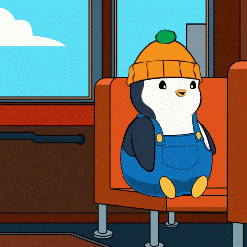 A Penguin Wearing Overalls And An Orange Hat Is Sitting On A Bus GIF