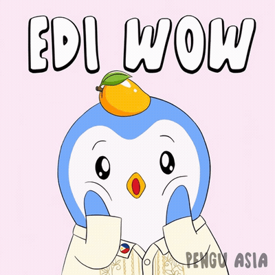 A Penguin With A Mango On Its Head And The Words Edi Wow Behind It GIF