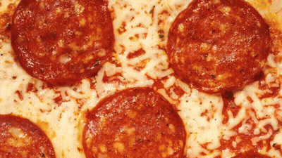 A Pepperoni Pizza With A Lot Of Cheese On It GIF
