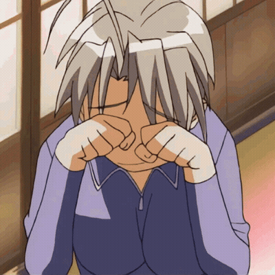 A Person Covering Their Face With Their Hands GIF