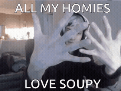 A Person Covering Their Face With Their Hands With The Words All My Homies Love Soupy GIF