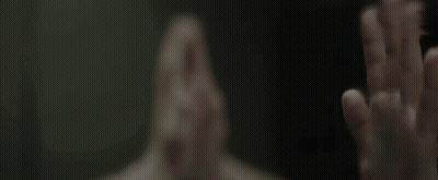 A Person Covering Their Face With Their Hands GIF