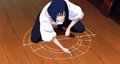 A Person Drawing A Circle On The Floor With Chalk GIF