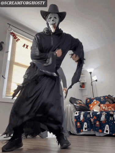 A Person Dressed As Scream For Ghosty Is Dancing GIF