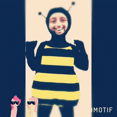 A Person Dressed In A Bee Costume With Motif Written On The Bottom Right GIF