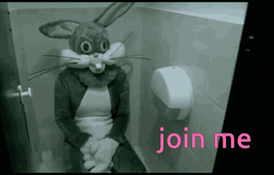 A Person Dressed In A Bunny Costume Is Sitting On A Toilet GIF