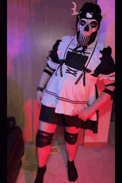 A Person Dressed In A Maid Outfit With A Hello Kitty Hat GIF