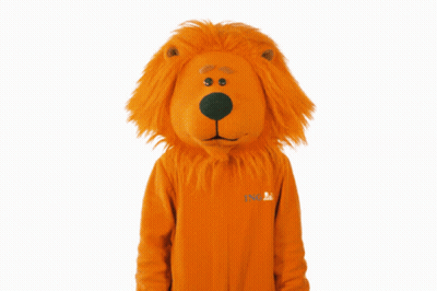 A Person Dressed In An Orange Lion Costume With A Nl Logo On The Front GIF