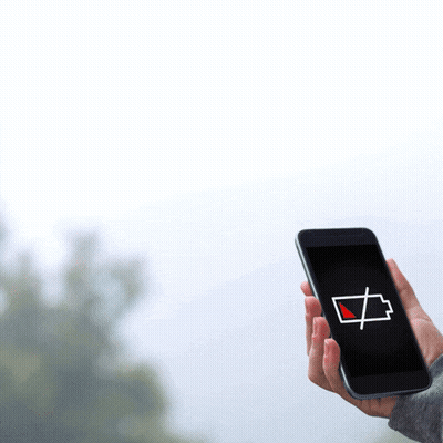 A Person Holding A Cell Phone With A Low Battery Icon On The Screen GIF