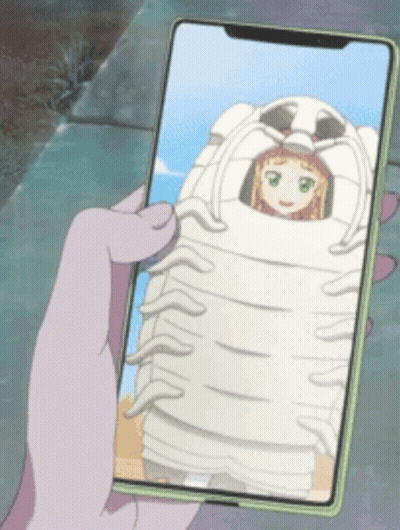 A Person Holding A Cell Phone With A Picture Of A Girl In A Lobster Costume GIF