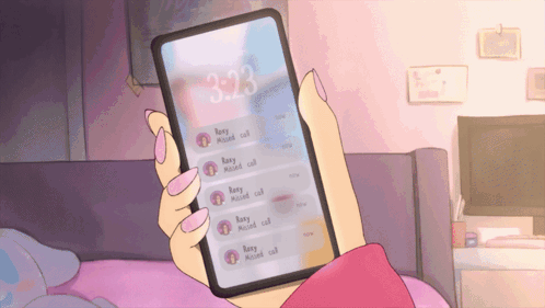 A Person Holding A Cell Phone With The Time Of 3:23 On It GIF
