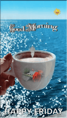 A Person Holding A Cup Of Coffee In Front Of The Ocean With The Words Good Morning Happy Friday GIF