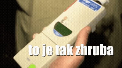 A Person Holding A Device That Says To Je Tak Zhruba On It GIF