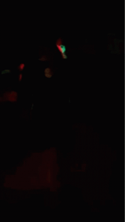 A Person Holding A Glowing Object In Their Hand GIF