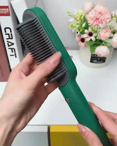 A Person Holding A Green Comb In Front Of A Craft Book GIF