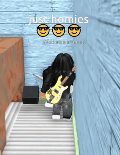 A Person Holding A Guitar In Front Of A Wall With The Words Just Homies GIF