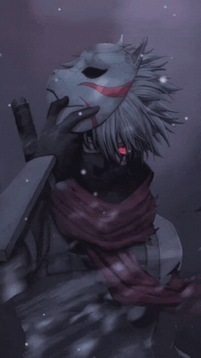 A Person Holding A Mask With A Red Eye GIF