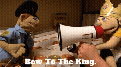 A Person Holding A Megaphone With The Words Bow To The King Written On It GIF