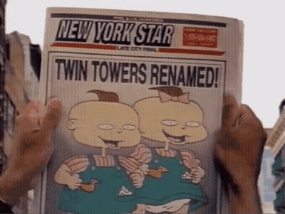A Person Holding A Newspaper That Says New York Star GIF