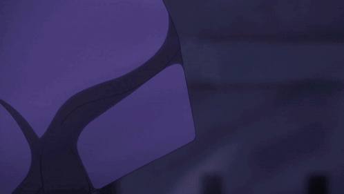 A Person Holding A Pair Of Blue Swords In The Dark GIF