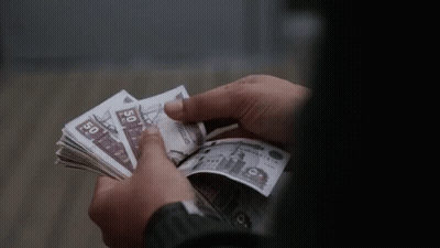 A Person Holding A Stack Of 50 Dollar Bills GIF