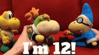 A Person Holding A Stuffed Animal With The Words I 'M 12 GIF