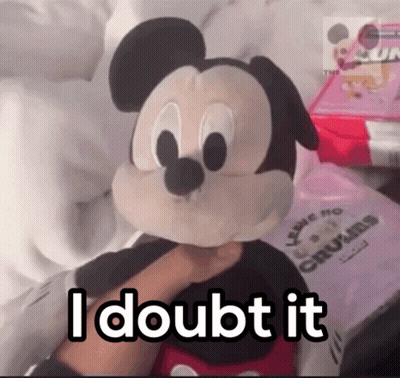 A Person Holding A Stuffed Mickey Mouse With The Words " I Doubt It " Above It GIF
