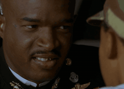 A Person Holding Another Person 'S Hand With The Words " Now You May Feel A Little Bit Of Pressure " Below Them GIF