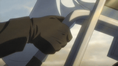 A Person In A Black Suit Is Holding A White Chair GIF