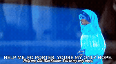 A Person In A Blue Jacket Is Standing In Front Of A Blue Background And Talking To Obi-Wan Kenobi . GIF