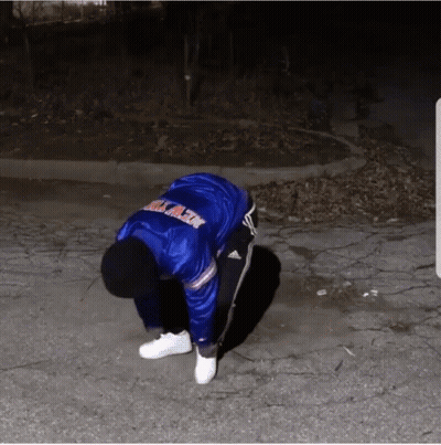 A Person In A Blue Jacket That Says Brooklyn On It GIF