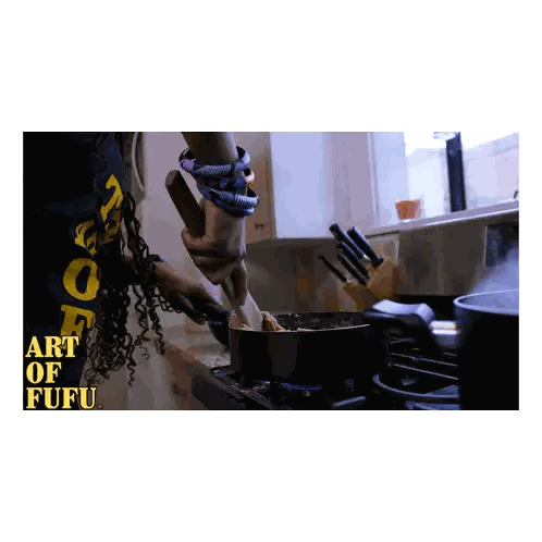 A Person In A Blue Shirt That Says Art Of Fufu Is Stirring Food In A Pot Sticker