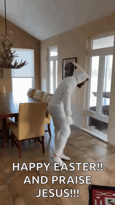 A Person In A Bunny Costume Is Dancing In A Room With The Words Happy Easter And Praise Jesus !!! GIF