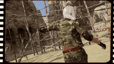 A Person In A Camouflage Uniform Is Standing In Front Of A Sign That Says ' A.m.p. ' GIF