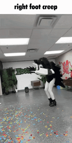 A Person In A Costume Is Dancing In A Room With Confetti And The Words Right Foot Creep On The Bottom GIF