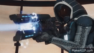 A Person In A Futuristic Suit Is Holding A Gun And Shooting A Laser Beam . GIF